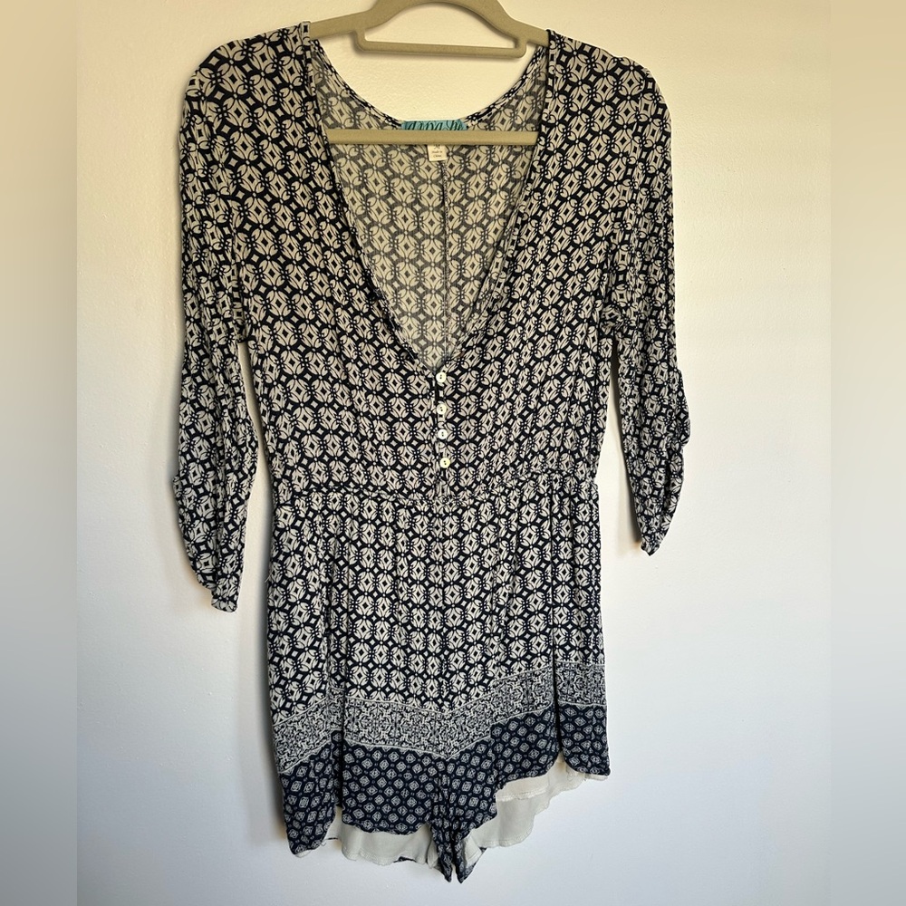 Long Sleeve Navy Blue and Cream Romper. Built in shorts.